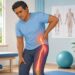 Dor lombar que desce pela perna: a pista que diferencia ciática de dor muscular comum e orienta o tratamento
